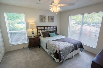 Spacious bedroom with comfortable bed